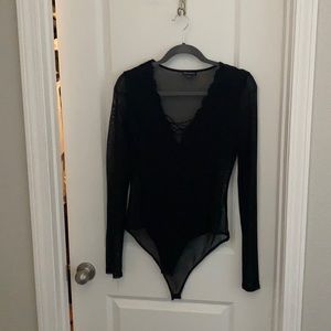 Sheer black bodysuit